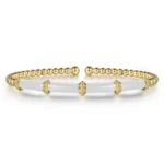 Modern Bujukan Bar Bangle in 21K Yellow Gold and White Enamel
