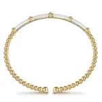 Modern Bujukan Bar Bangle in 21K Yellow Gold and White Enamel - Image 4